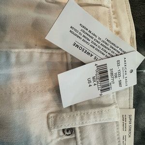 American Eagle white denim high waste and low cut shorts.